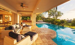 Swimming pool with surround